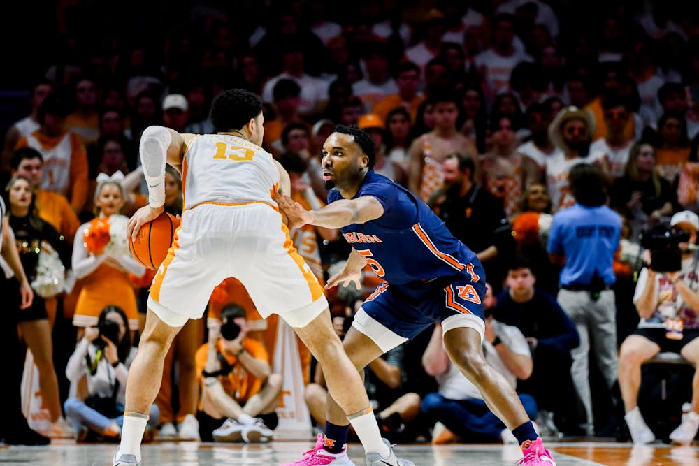 Auburn forward Chris Moore (5) plays defense against Tennessee, on February 4, 2023, in Knoxville, TN. 