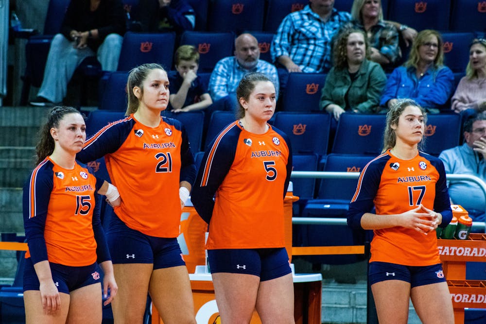 <p>Nov. 21, 2021: Kate Curtis (15), Tatum Shipes (21), Audrey Douglas (5) and Cassidy Tanton (17) during a match against Kentucky from Auburn Arena in Auburn, Ala.</p>