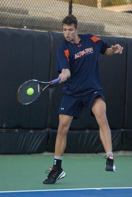 Andreas Miles returns a serve from Matt Brewer of Tennessee. Rod Guajardo/ MANAGING EDITOR