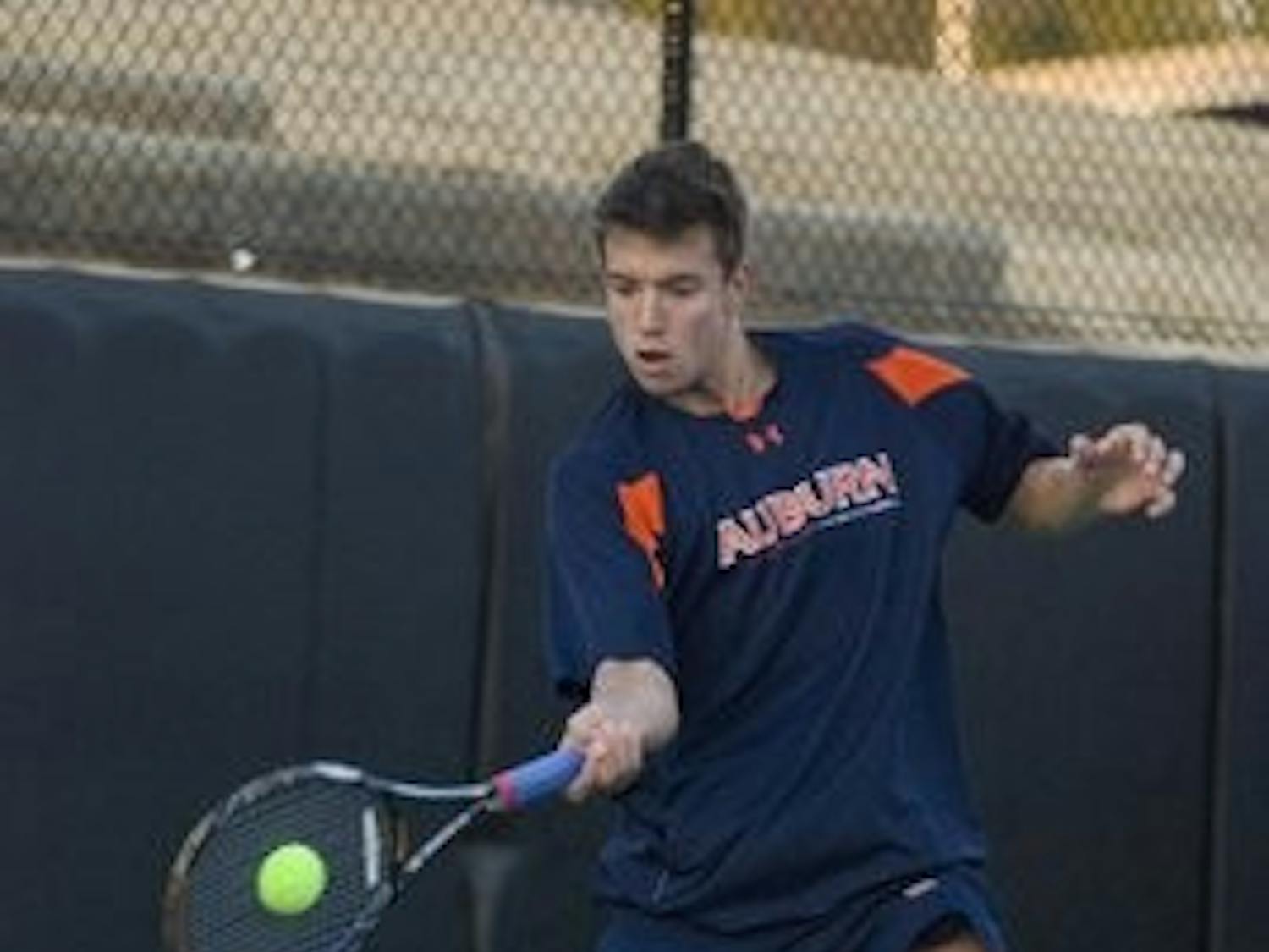 Andreas Miles returns a serve from Matt Brewer of Tennessee. Rod Guajardo/ MANAGING EDITOR