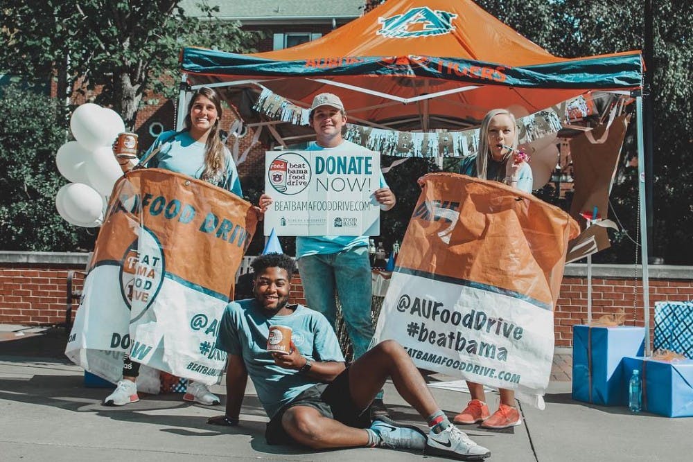 The University of Alabama's Beat Auburn, Beat Hunger Food Drive came out on top, but the two schools raised the most this year in the competition's 25-year history.