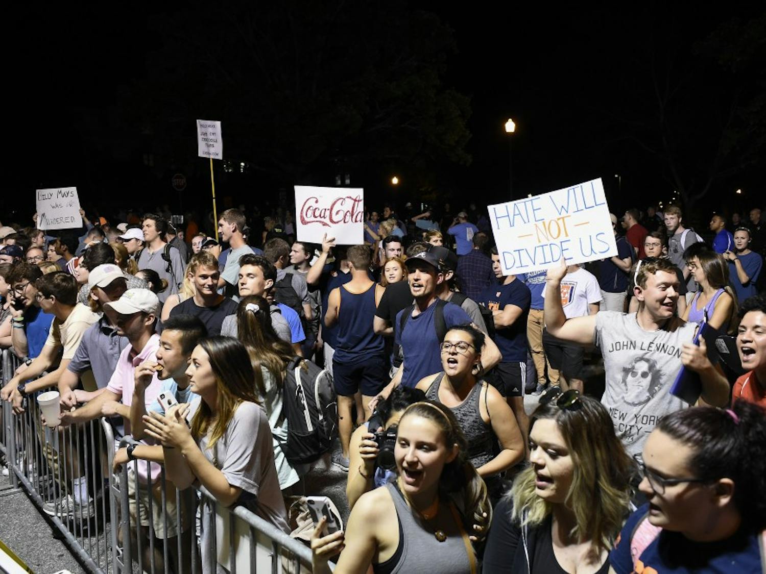 Auburn students congregate on Thach Avenue near Foy Hall after alt-right leader Richard Spencer's talk on Tuesday, April 18, 2017 in Auburn, Ala. 