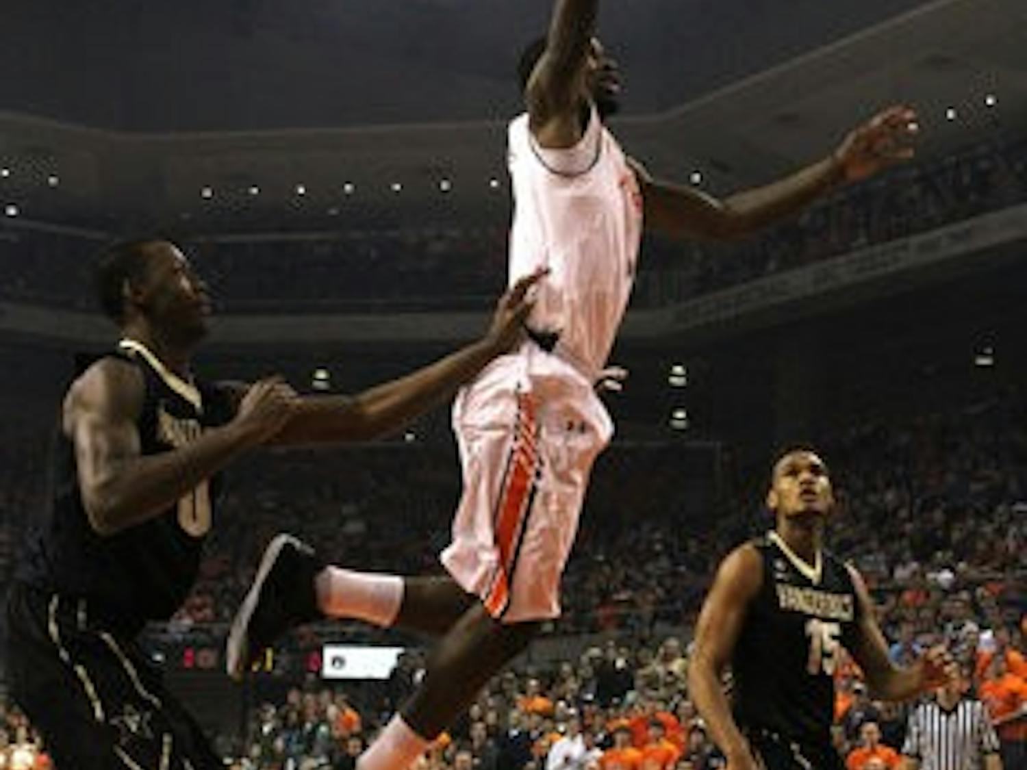 Shaquille Johnson leaps to the hoop in hopes to give the Tigers two points against Vanderbilt on Saturday, March 2. (Katherine McCahey / ASSISTANT PHOTO EDITOR)