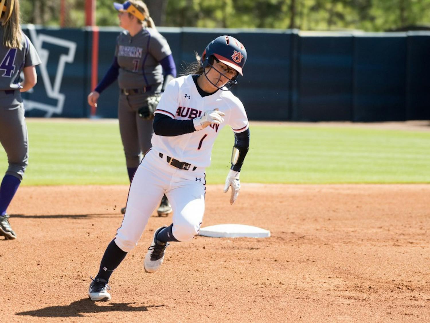 KK Crocker rounds second base during Auburn softball vs. Western Illinois on Sunday, Mar. 4, 2018, in Auburn, Ala.