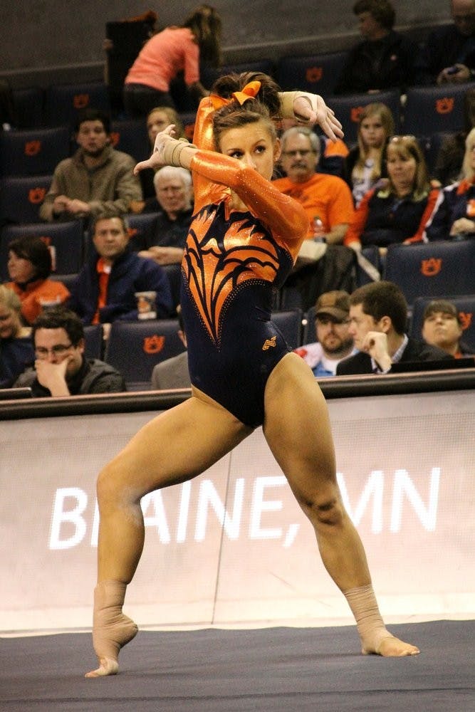 Lexus Demers performing her floor routine against Missouri. (Danielle Long | Photographer)