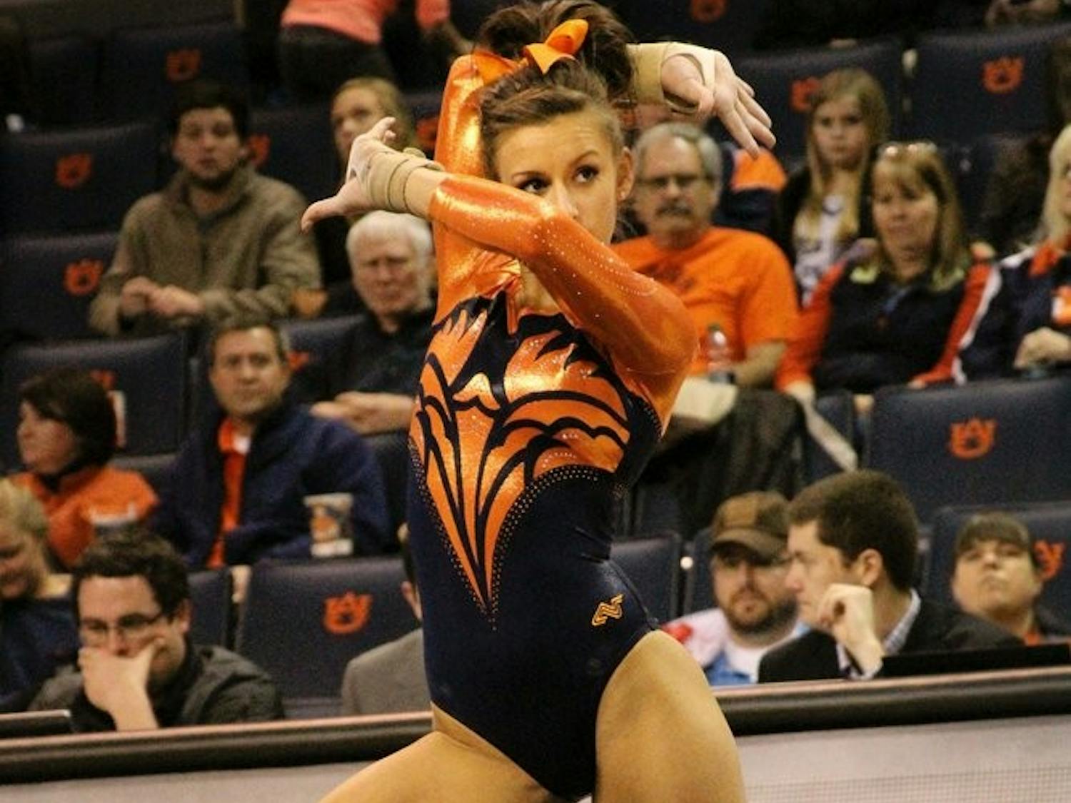 Lexus Demers performing her floor routine against Missouri. (Danielle Long | Photographer)