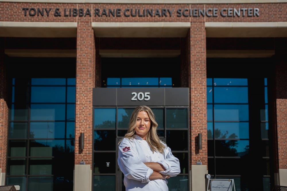 Adi Ansley stands in front of Culinary Science Center on Sep. 21, 2022