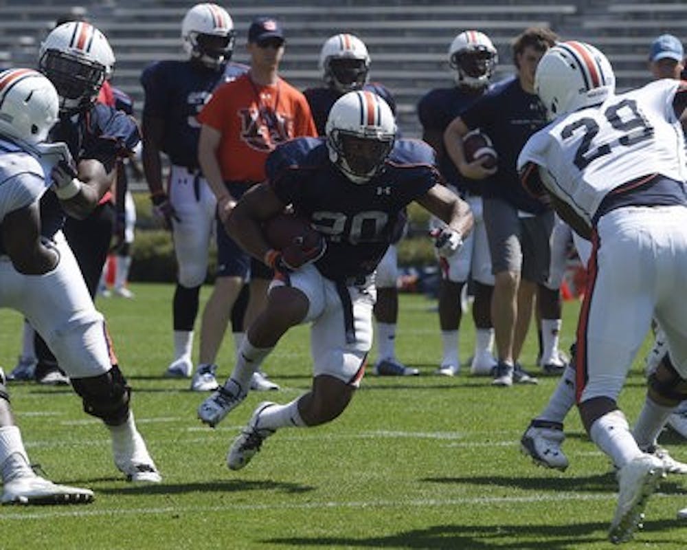 Corey Grant runs during a 11-on-11 drill at Jordan-Hare Stadium on Saturday, April 12. (Contributed by Lauren Barnard)