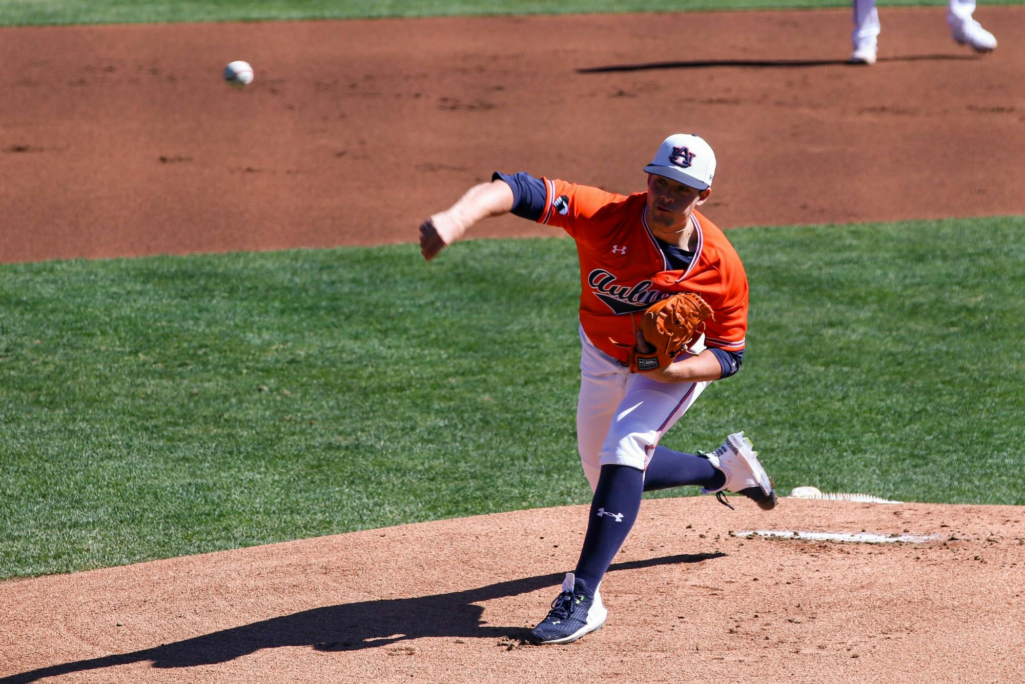 022121_Auburn_IMG_7372_Auburn Tigers pitcher Mason Barnett (18) pitches the ball .jpg