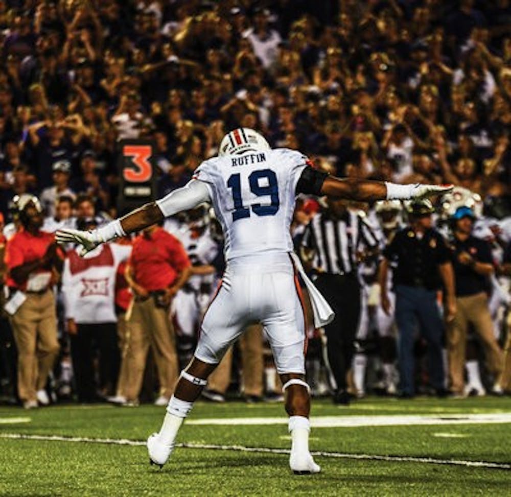 Nick Ruffin celebrates after a pass breakup against K-State. (Raye May | Photo Editor)