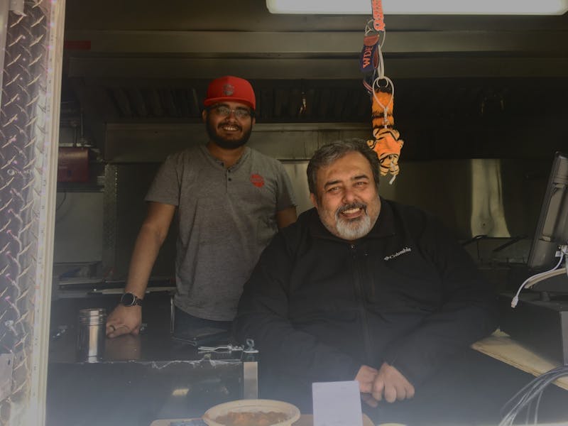 Father and son Sunel and Sunny Merchant in the Good Karma food truck.