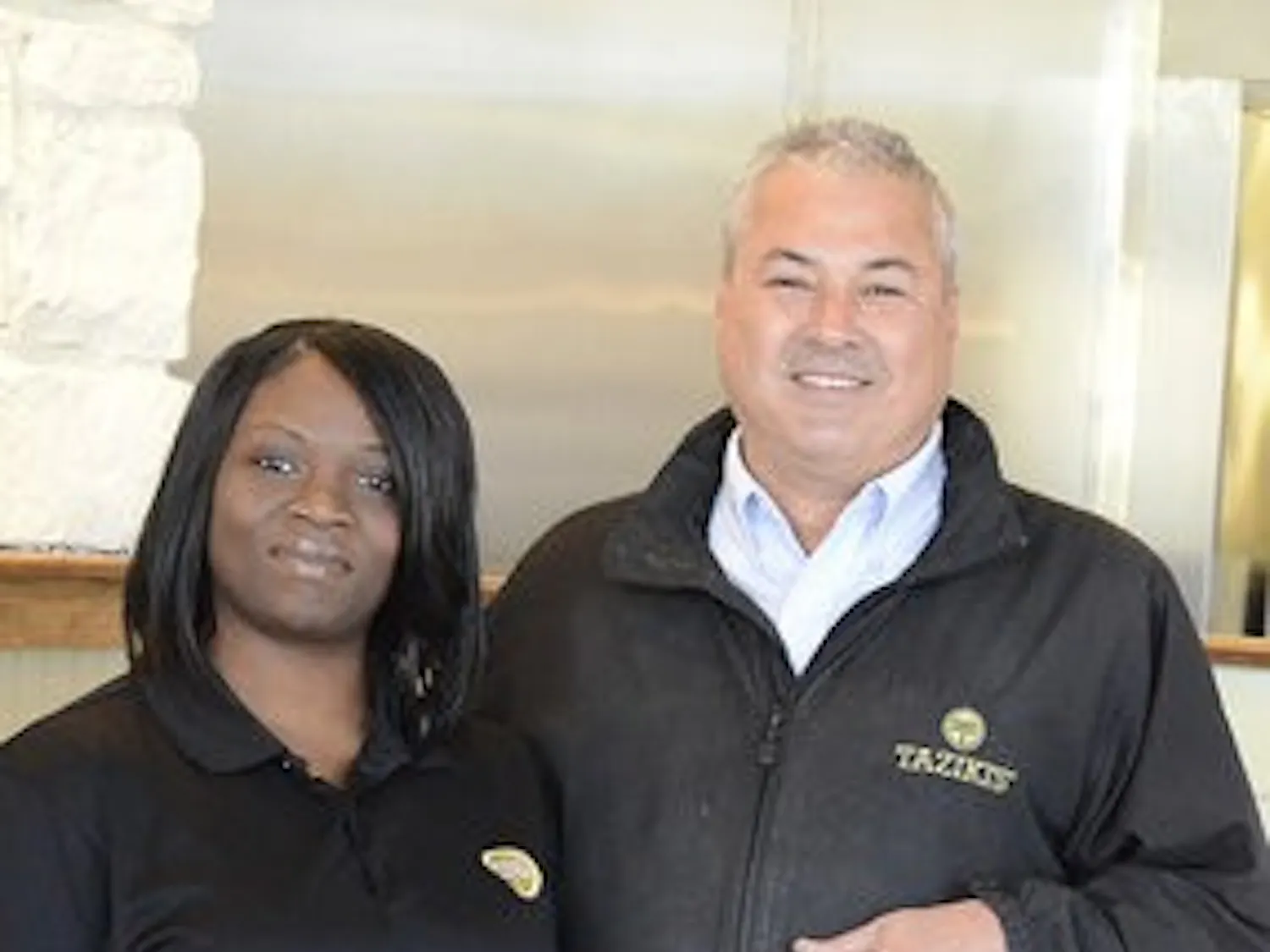 Eugene O'Donnell stands outside Auburn's newest Greek-fare restaurant