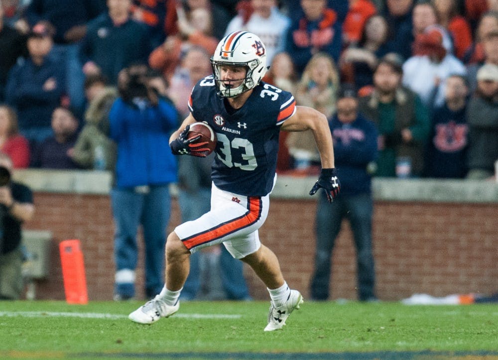 Will Hastings (33) runs after a catch in the second half. Auburn vs Alabama on Saturday, Nov. 25 in Auburn, Ala.