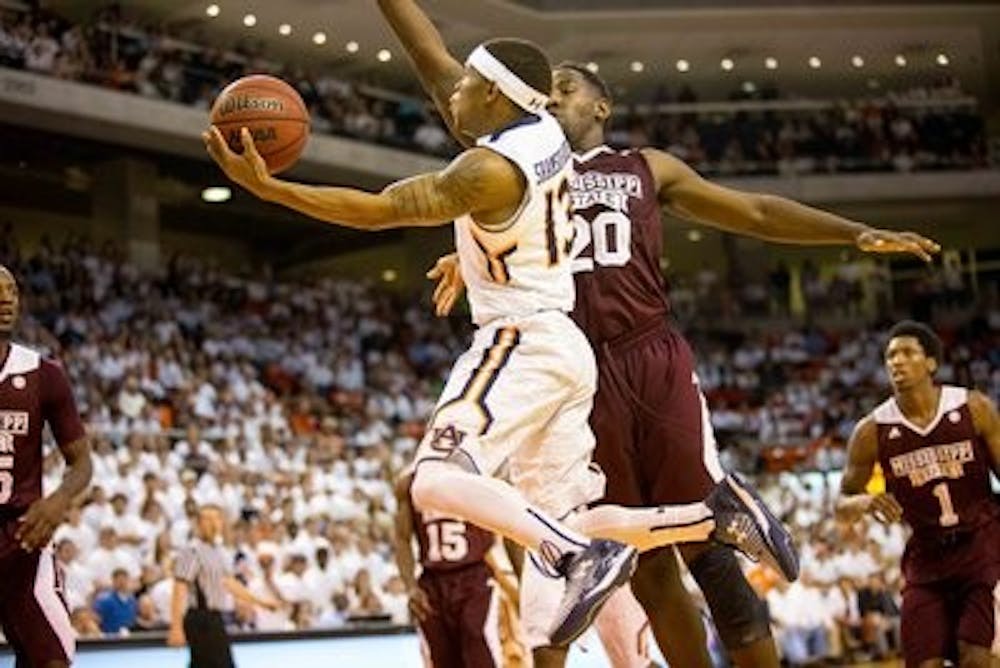 Tahj Shamsid-Dean attempts a layup against Mississippi State. (Kenny Moss / Assistant Photo Editor)
