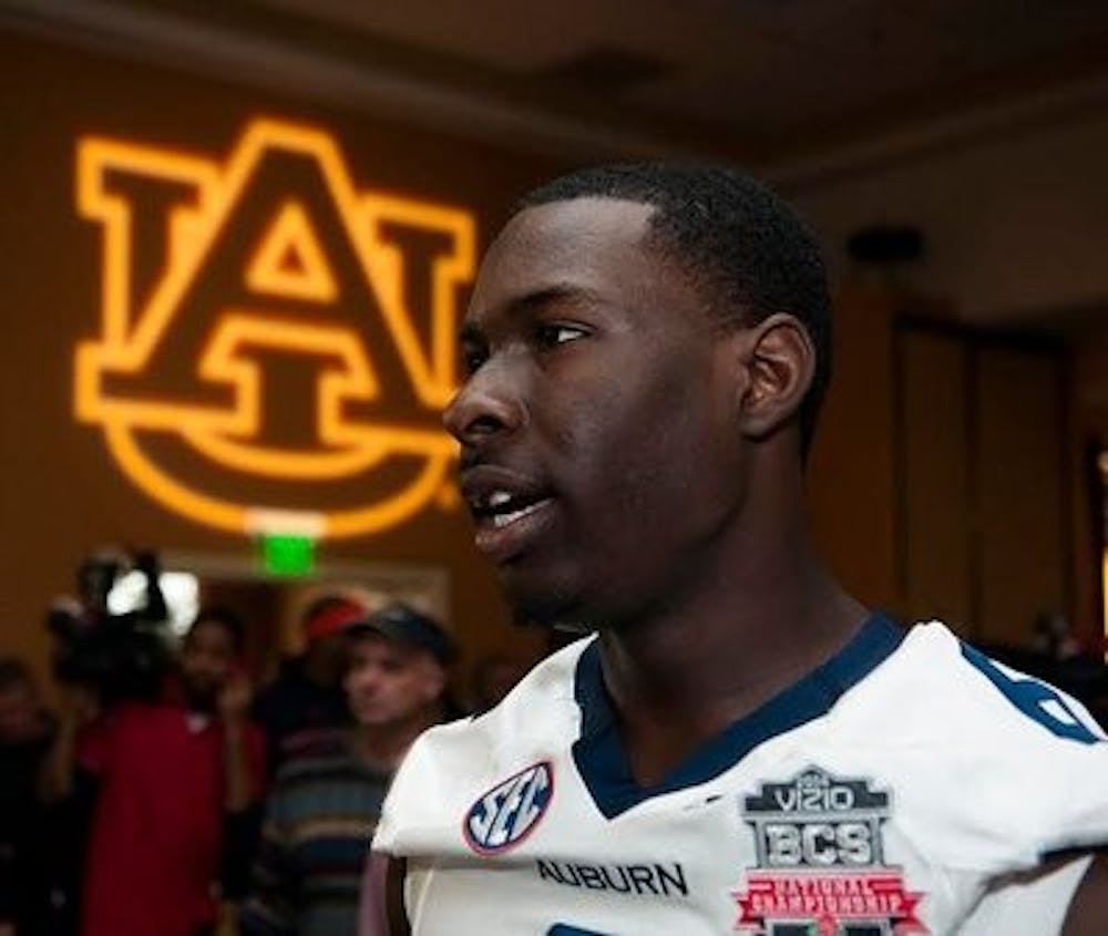 Auburn freshman quarterback Jeremy Johnson talks with reporters Saturday during BCS National Championship Media Day.
(Zach Bland / PHOTOGRAPHER)