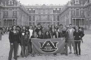 Last year's group visited the Vatican and listened to the Pope. Here they are seen outside Versailles. (Courtesy of the Auburn Alumni Association)