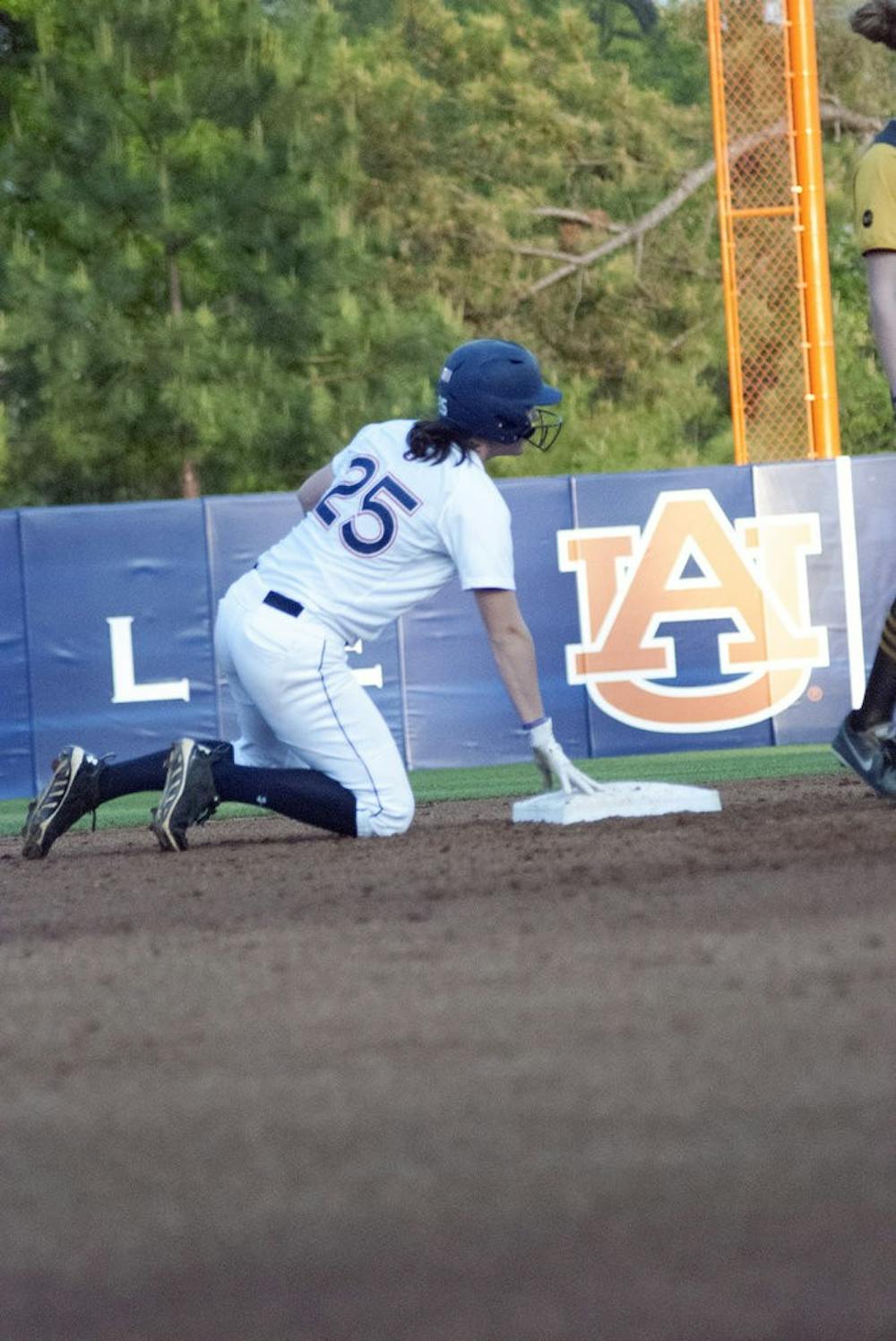 McKenzie Kilpatrick (#25) secures second plate. (Emily Enfinger | Assistant Photo Editor)