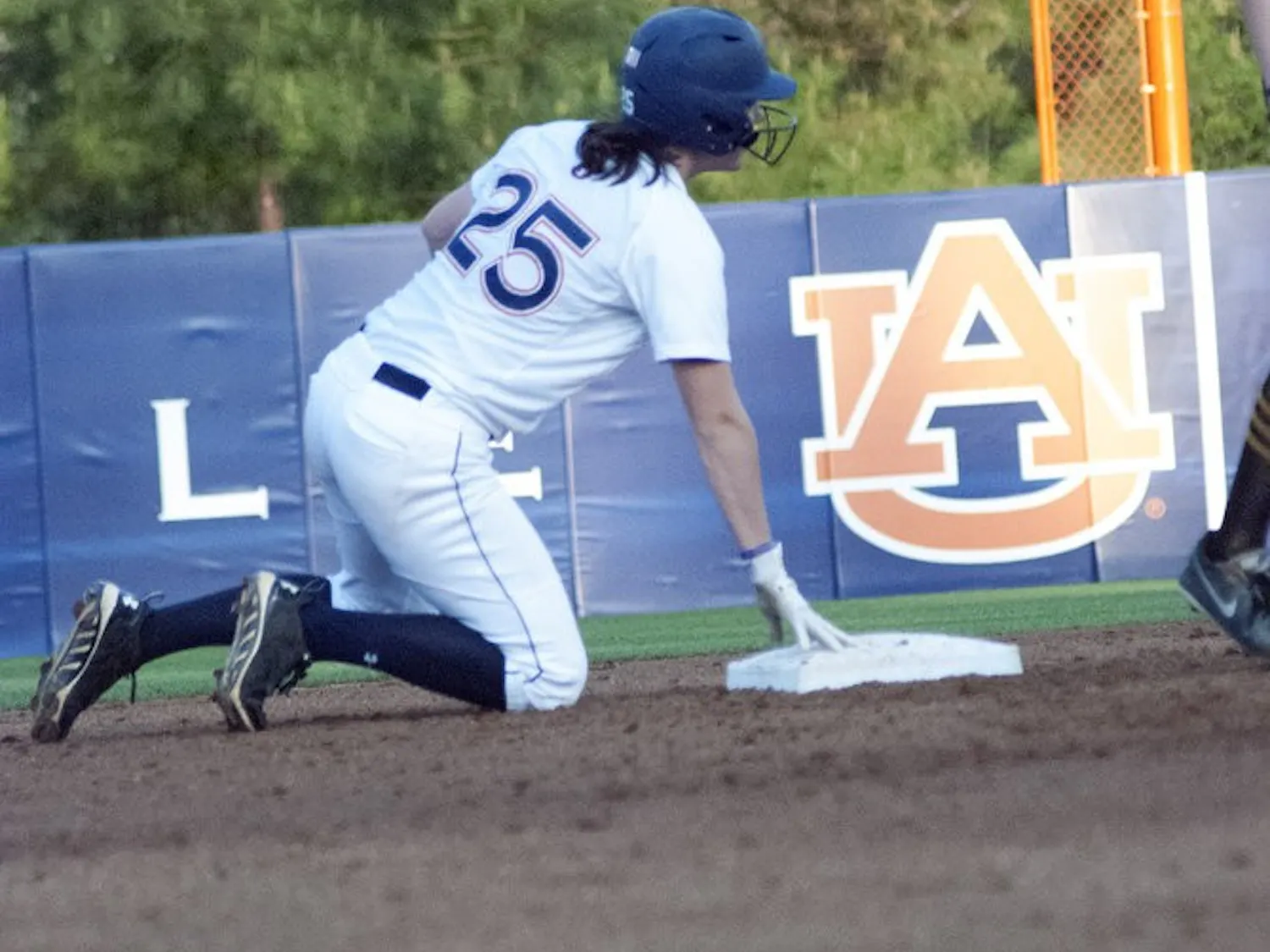 McKenzie Kilpatrick (#25) secures second plate. (Emily Enfinger | Assistant Photo Editor)