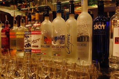 An array of fine vodkas awaits the class, with tasting glasses ready and laid out for the class. (Charlie Timberlake / assistant photo editor)