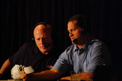 Rod Bramblett (left) and head coach Gene Chizik (right) read the winner of a raffle for a piece of Auburn artwork during Tiger Talk Thursday night.

(Charlie Timberlake / Assistant Photo Editor)
