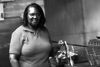 Rosezena "Mama Rose" Gunn serves the Auburn community with home cooking. She said she treats her customers the way she would want to be treated.  (Rebecca Croomes / PHOTO EDITOR)