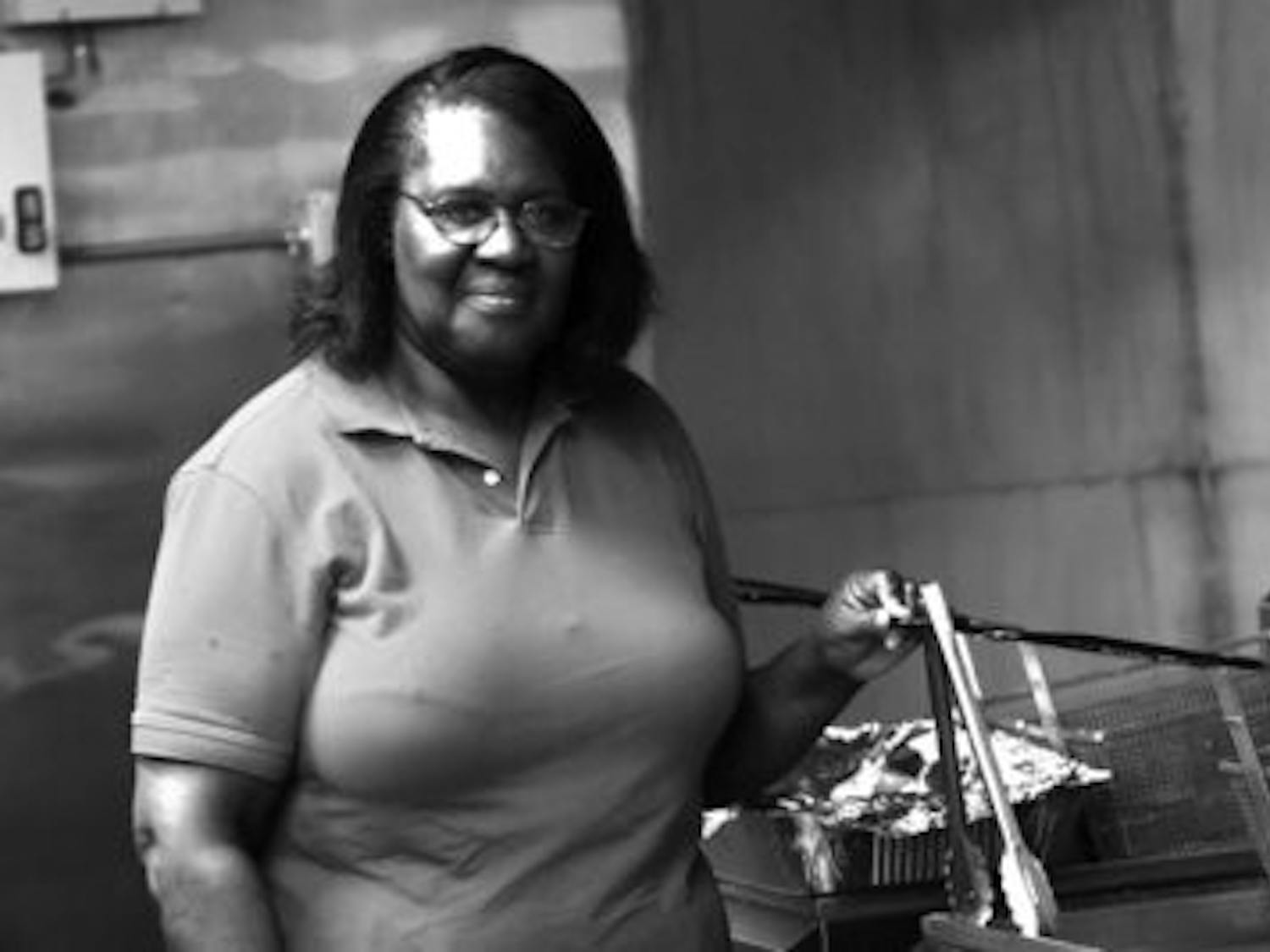 Rosezena "Mama Rose" Gunn serves the Auburn community with home cooking. She said she treats her customers the way she would want to be treated.  (Rebecca Croomes / PHOTO EDITOR)