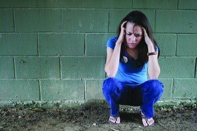 Kayla Burke begins to crack under the pressure of graduate school classes. (Emily Adams/ PHOTO EDITOR)