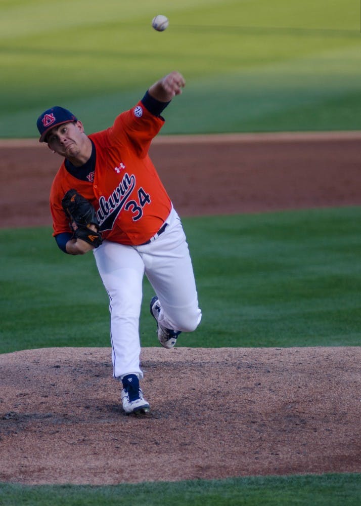 Ben Braymer (34) pitches during the Alabama State vs Auburn baseball game at Plainsman Park in Auburn, Ala., on Tuesday, March 23, 2016. Auburn defeated ASU 11-0.