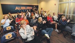 The women's soccer team celebrates after its berth in the NCAA tournament was announced Monday, Nov. 5. (Courtesy of Todd Van Emst)