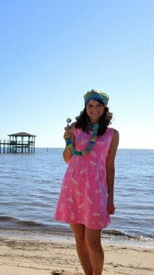 Kelley Andrews, creator of Button Up Sunshine, models her products. (CONTRIBUTED)