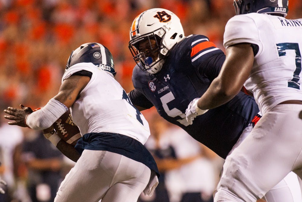 Derrick Brown (5) tackles Shai Werts (4) in the first half. Auburn vs Georgia Southern on Saturday, Sep. 2 in Auburn, Ala.
