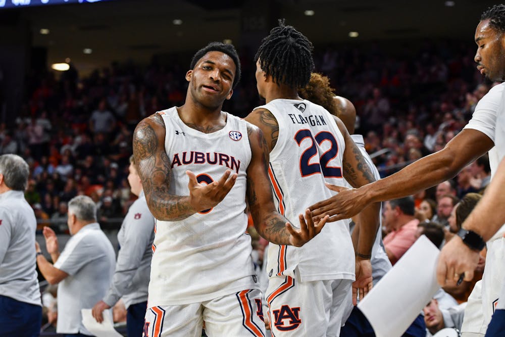 Auburn guard K.D. Johnson (0) walks off the court after a foul is called during a matchup against Texas A&M in Neville Arena on Jan. 25, 2023.
