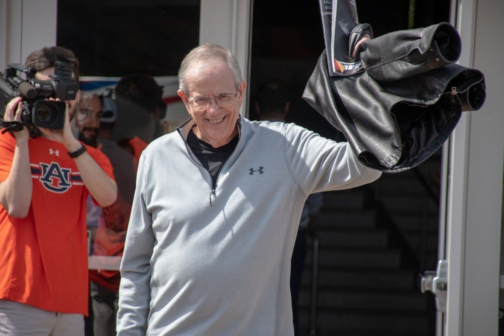 Former Auburn head coach Sonny Smith walks through the reverse Tiger Walk as the Auburn Men's Basketball team departs for Minneapolis, Minn., on Wednesday, April 3, 2019, in Auburn, Ala.
