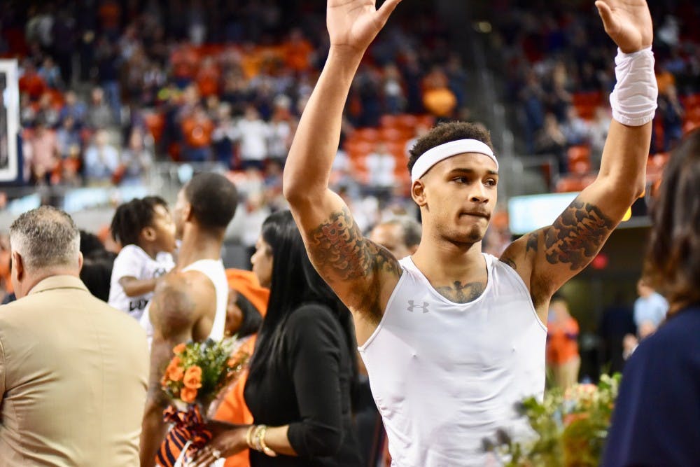 Bryce Brown (2) celebrates during Senior Day before Auburn Men's Basketball vs. Tennessee on Saturday, March 9, 2019, in Auburn, Ala. 