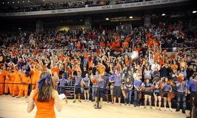 Cheering students show their support for Auburn gymnastics at Friday's meet against the University of Alabama. (Courtesy of Todd Van Emst)