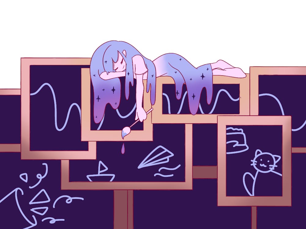 <p>A girl sleeps on blackboards with a paint brush in her hand.</p>