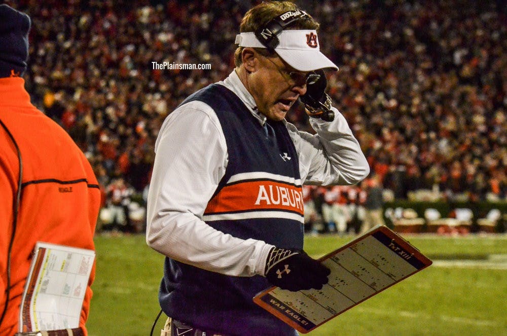 Gus Malzahn reacts to a penalty late in the third quarter against UGA in Athens.

Raye May / PHOTO EDITOR