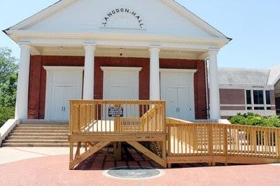 A temporary handicap ramp was built in front of Langdon Hall with care to avoid the Auburn seal.