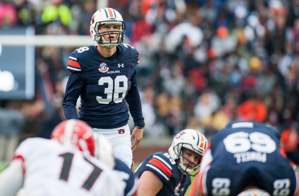Daniel Carlson (38) lines up for a field goal in the first half. Auburn vs Georgia on Saturday, Nov. 11 in Auburn, Ala.