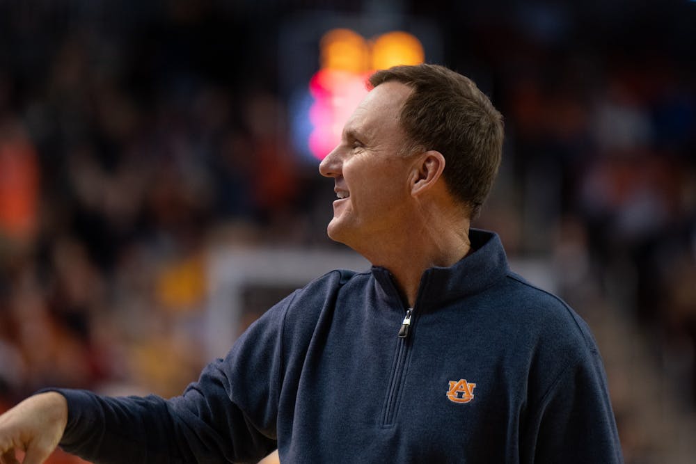 Auburn football offensive coordinator Chad Morris waves to the crowd during Auburn Men's Basketball vs. Iowa State on Sat, Jan. 25, 2020, in Auburn, Ala.