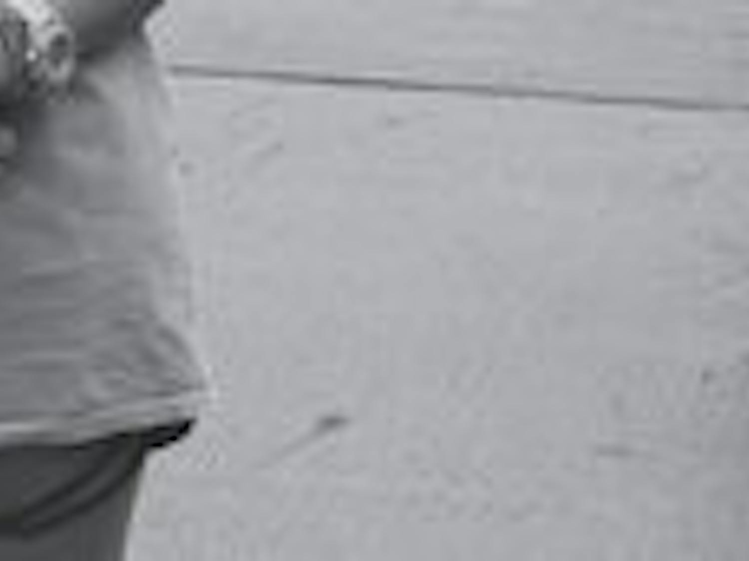 2012
Katie Cornwell, sophomore in pre-business, continues the Nike short trend of today: Nike shorts paired with an oversized T-shirt and accessories like watches and bracelets. (Melody Kitchens / INTRIGUE EDITOR)