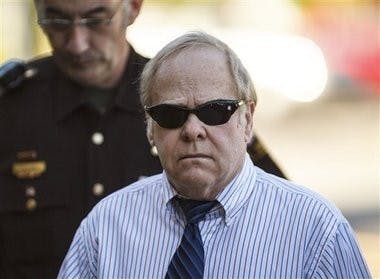Harvey Updyke walking to the Lee County courthouse June 20. (Courtesy of Vasha Hunt, Opelika-Auburn News)