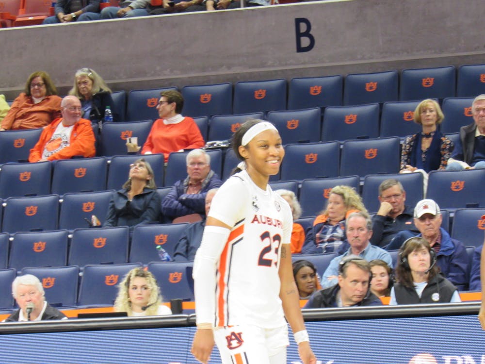 <p>Nov. 16, 2021; Honesty Scott-Grayson (23) smiles during a game between Auburn and Alabama State from Auburn Arena in Auburn, Ala.</p>