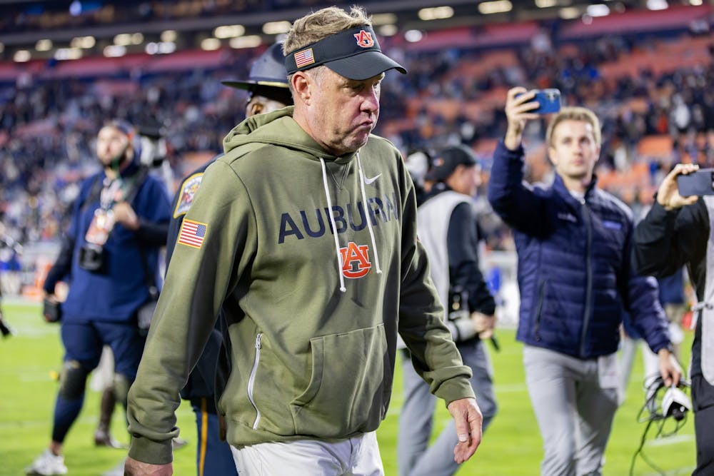 Hugh Freeze walks off following a loss to Kentucky in Jordan-Hare Stadium on November 1, 2025.