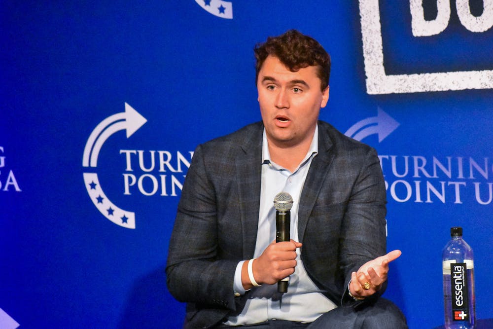 <p>Conservative activist and radio-talk show host Charlie Kirk and co-host Allie Stuckey address members of the Turning Point Auburn chapter and general members of the community at the Hotel at Auburn University on March 31, 2022.</p>