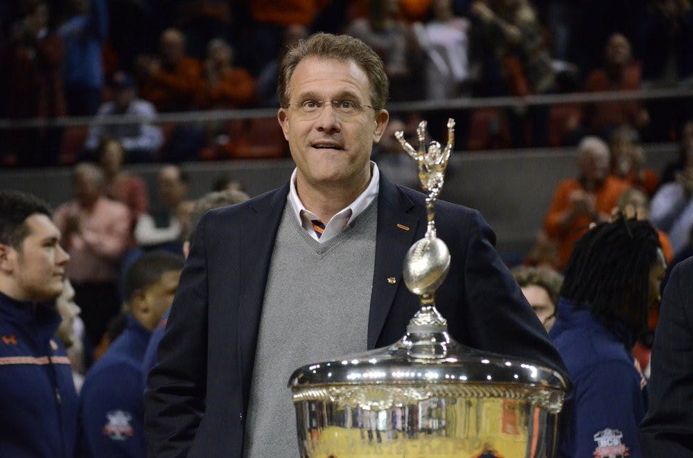 Head football coach Gus Malzahn accepting the Iron Bowl trophy at Thursday's game against Alabama. Sarah May/ASSISTANT PHOTO EDITOR.