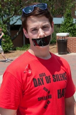 Adam Gatlin has taken a vow of silence to support the Gay Straight alliance's cause. His shirt reads, "Hear No, Speak No, See No Hate." Philip Smith / ASSISTANT PHOTO EDITOR