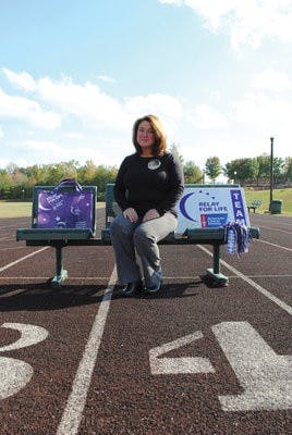 Robbi Beauchamp, Relay for Life coordinator, wears a photo of her sister-in-law, whom she lost to breast cancer. (Maria Iampietro / Associate Photo Editor)