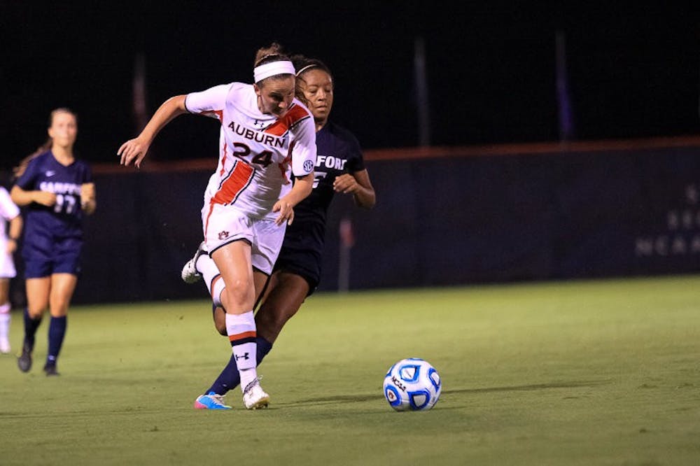 Casie Ramsier, 24, dribbling downfield. (Kenny Moss | Photographer)