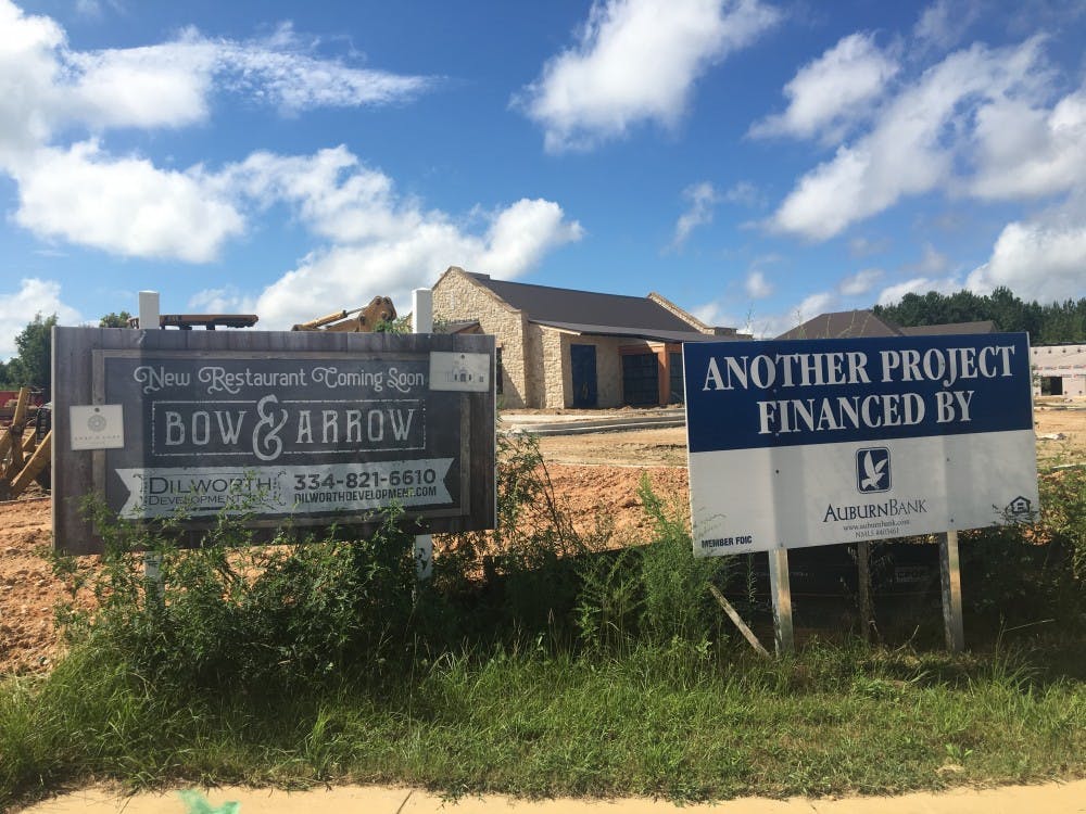 <p>&nbsp;A sign advertising the Bow &amp; Arrow restaurant stands outside its construction on Saturday, Sep. 9, 2018, in Auburn, Ala.&nbsp;</p>